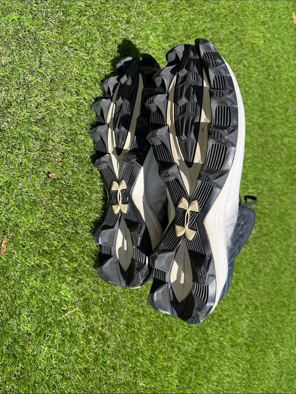 Under Armour Men’s White and Black High-Top Athletic Cleats